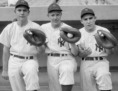 Aaron Robinson (left) is shown during his years with the New York Yankees, with fellow catchers Ralph Houk and Yogi Berra. 