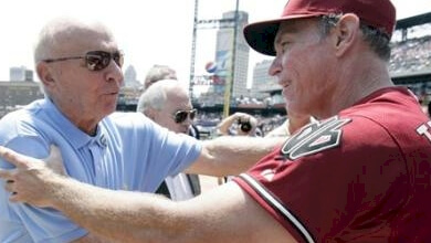 Dick Tracewski greets Alan Trammell in 2011 at Comerica Park when Sparky Anderson's number was retired by the Tigers.