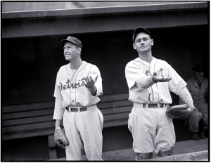 Jake wade and Dixie walker check for rain before a game at Fenway Park in 1938.