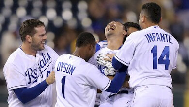 Norichika Aoki is congratulated by his teammates, indluding former Tiger Omar Infante aftr a walkoff win earlier this season.