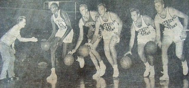 Coach Charles Eckman runs five of his players through drills in 1957 as the team prepared for their first season in Detroit.