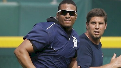 Victor Martinez runs with current Detroit strength and conditioning coach Chris McDonald.