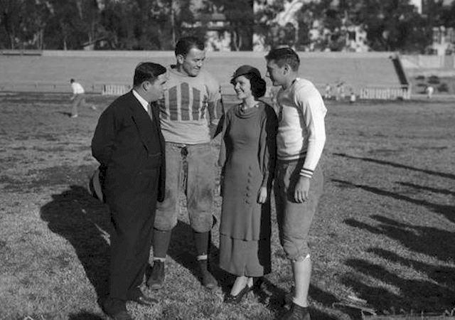 Alabama football coach Frank Thomas (left) with Mildred Cowan and players Bill Lee and Dixie Howell (right), in 1934.